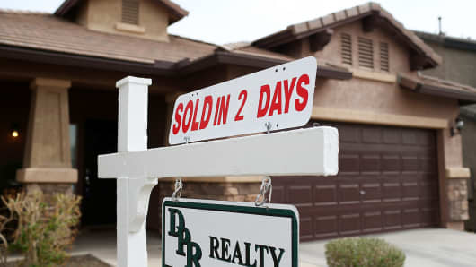 A sold sign is posted in front of a home in Phoenix, Arizona.