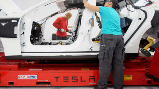 Tesla primed to expand after tax credit