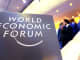 A logo sits on a sign at the World Economic Forum in Davos, Switzerland, on Thursday, Jan. 23, 2014.