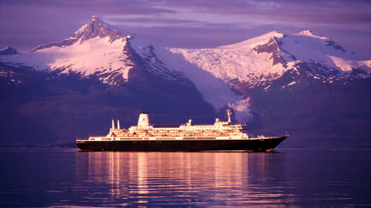 A cruise ship in the  Stephens Passage, Alaska at sunset.