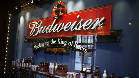 Budweiser beer sits on display under a sign inside the Anheuser-Busch brewery in St. Louis.