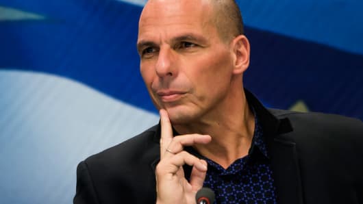 Newly appointed Greek Finance Minister Yanis Varoufakis attends a hand over ceremony in Athens, January 28, 2015.