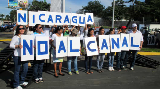 Thousands of demonstrators march against the 173-mile Interoceanic Grand Canal that they say will negatively impact the environment, communities and Nicaraguan sovereignty, in Managua, Nicaragua, December 10, 2014.