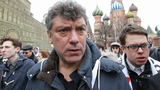 Russian opposition politician and former Deputy Prime Minister Boris Nemtsov attends an unsanctioned rally at Red Square, April 8, 2012, in Moscow.
