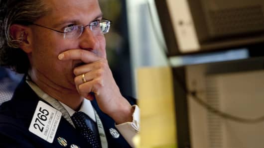 Donald Civitanova works at a post on the floor of the New York Stock Exchange in New York, U.S., on Thursday, May 6, 2010.