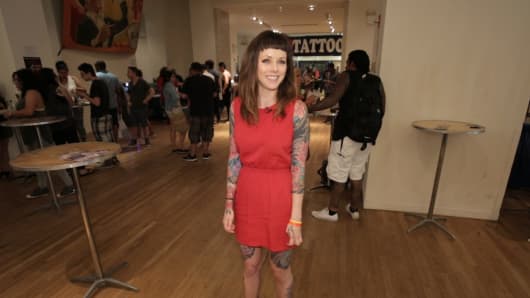 Tattoo model Megan Leahy shows off her body suit at the NYC Tattoo Convention in June.