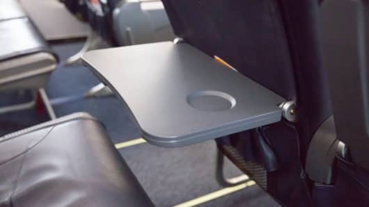 نتيجة بحث الصور عن ‪tray seat on plane board‬‏