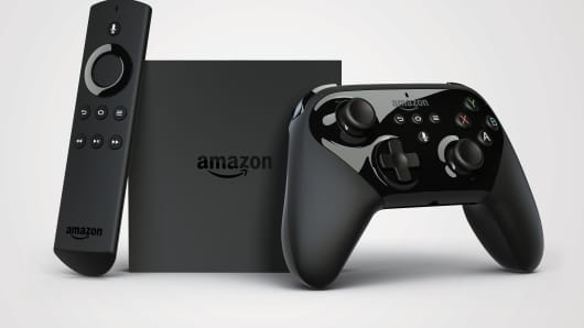 Amazon TV with remote and controller.