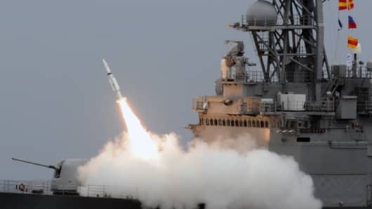 A Taiwan navy destroyer launches an air missile during a lifefire drill at sea in 2013.