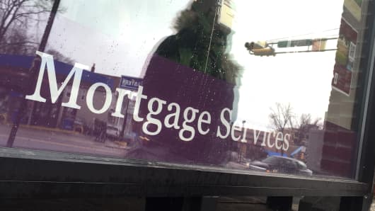 Mortgage services signage outside a Berkshire Hathaway Home Services office in Montclair, N.J.