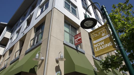 A 'now leasing' sign is posted in front of apartments in Berkeley, California.