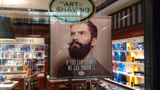 A poster displayed the window of The Art of Shaving store in New York City.
