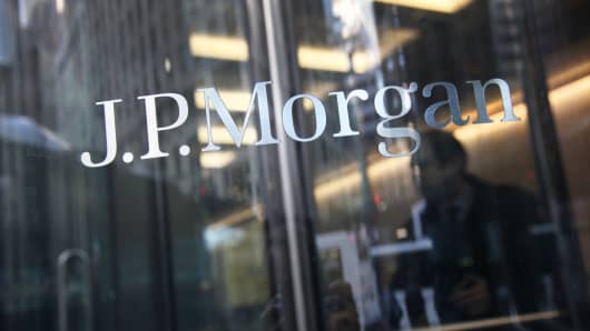 JPMorgan signage on the door of an office building in New York.