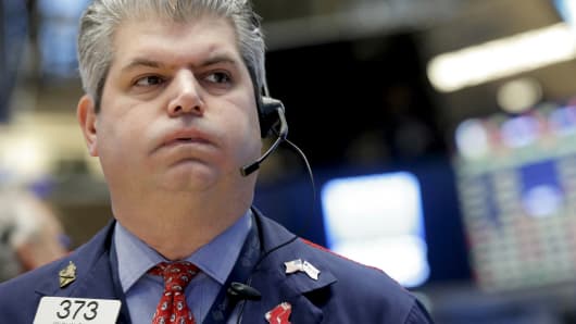 A trader on the floor of the New York Stock Exchange, January 15, 2016.