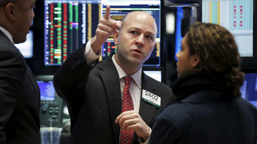 Traders on the floor of the New York Stock Exchange.