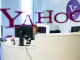 An employee works at her desk inside the office at the Yahoo Inc. headquarters.