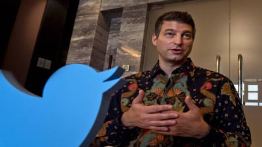 Twitter president of global revenue and partnership Adam Bain speaks at a press conference in Jakarta on August 29, 2014.