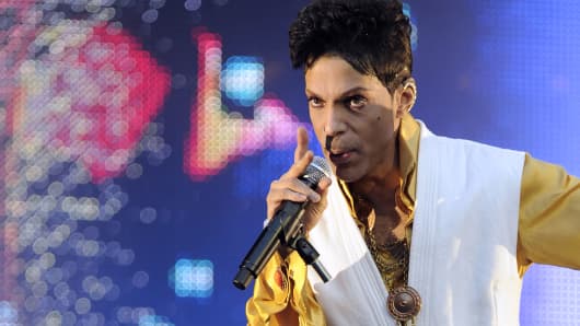 Singer and musician Prince (born Prince Rogers Nelson) performs on stage at the Stade de France in Saint-Denis, outside Paris, on June 30, 2011.