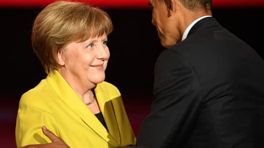 U.S. Barack Obama greets German Chancellor Angela Merkel at the opening evening of the Hannover Messe trade fair on April 24, 2016 in Hanover, Germany.
