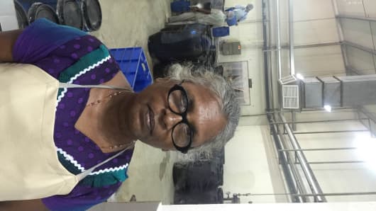 Rasanayagam Sarojinidevi, 64, lost both her sons during the war and is still traumatized, but says she has found a new purpose working at a food processing factory owned by Cargills Ceylon.
