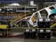 An SUV moves through the assembly line at the General Motors Assembly Plant in Arlington, Texas.