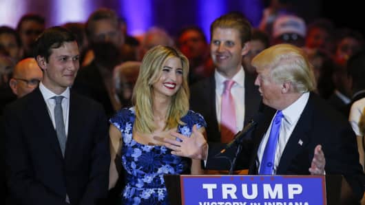 Jared Kushner (L) looks on as his wife Ivanka Trump smiles at her father Republican presidential front runner Donald Trump during his speech to supporters and the media at Trump Tower in Manhattan following his victory in the Indiana primary on May 03, 2016 in New York, New York.