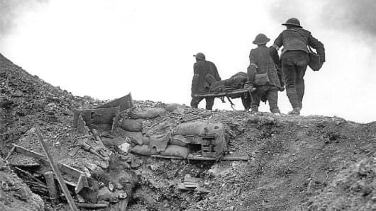 British stretcher bearers recovering a wounded soldier from a captured German trench during the Battle of Thiepval Ridge, late September 1916, part of the Battle of the Somme.