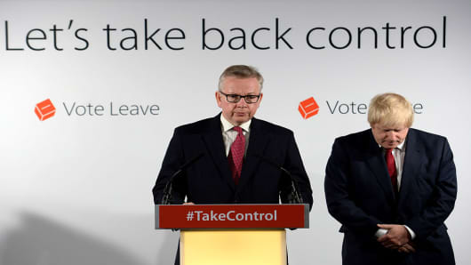 Michael Gove MP (L) speaks during a press conference following the results of the EU referendum at Westminster Tower on June 24, 2016 in London, England.