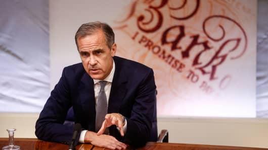 Mark Carney, governor of the Bank of England (BOE), gestures while speaking during the bank's quarterly inflation report news conference on Thursday, Aug. 4, 2016.