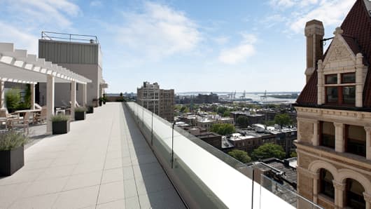 Roof decks are an important amenity at new apartment buildings in New York City.