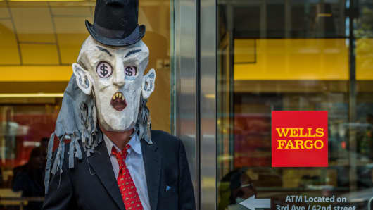 A concerned group of New York-based citizens, professionals, artists and activist groups staged a protest vs Wells Fargo's corporate headquarters for crimes against the American public.