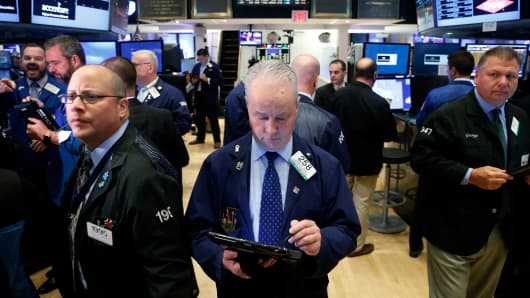Traders work on the floor of the New York Stock Exchange (NYSE) in New York City, U.S., November 7, 2016.