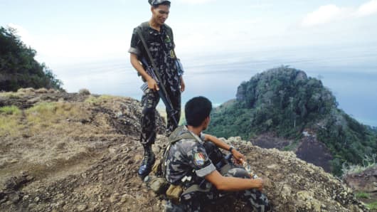 Philippine marines keep a look out for pirates in the Sulu Sea.