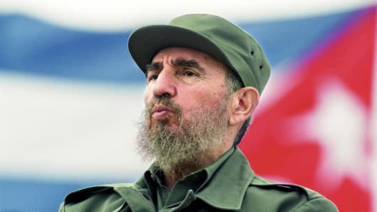 Fidel Castro observes the May Day parade at the Revolution Square in Havana, Cuba May 1, 1998.