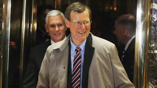 John Allison, center, a former chief executive of BB&T Corp, departs with Vice President-elect Mike Pence after a meeting with President elect Donald Trump at Trump Tower New York, November 28, 2016.