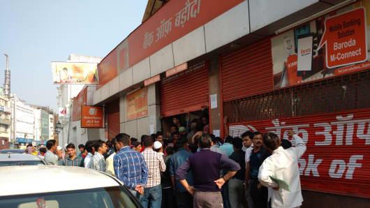 People lining up outside a branch of Bank of Baroda in New Delhi on November 23, 2016.