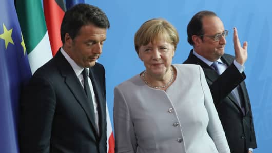 Angela Merkel, Francois Hollande (R) and Matteo Renzi depart after speaking to the media on June 27, 2016 in Berlin, Germany.