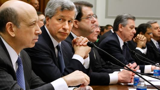 Executives from the financial institutions who received TARP funds, (L-R) Goldman Sachs Chairman and CEO Lloyd Blankfein, JPMorgan Chase & Co CEO and Chairman Jamie Dimon, The Bank of New York Mellon CEO Robert P. Kelly, Bank of America CEO Ken Lewis, State Street Corporation CEO and Chairman Ronald Logue, Citigroup CEO Vikram Pandit, Wells Fargo President and CEO John Stumpf testify before the House Financial Services Committee February 11, 2009 in Washington, DC.