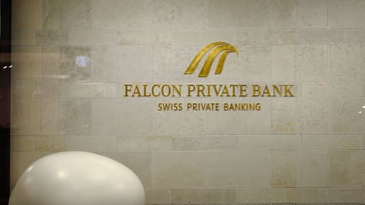 The logo of the Swiss Falcon Private Bank is pictured late on October 13, 2016 at the Falcon headquarters in Zurich.