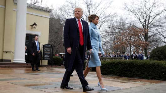President-elect Donald Trump and his wife Melania depart from services at St. John's Church during his inauguration in Washington, U.S., January 20, 2017.