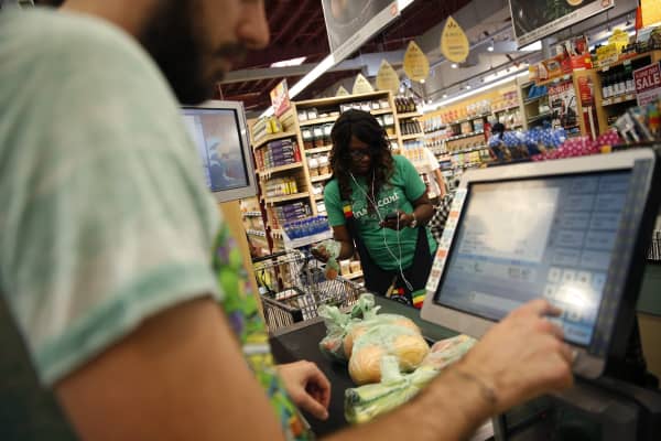 what does a cashier make at whole foods