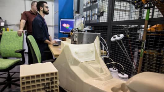 Ford Motor Company is exploring how large one-piece auto parts, like car spoilers, could be printed for prototyping and future production vehicles, as the first automaker to pilot the Stratasys Infinite Build 3D printer.