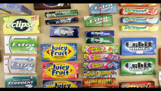 ** FILE ** Some of the Wm. Wrigley Jr. Co.'s 14 brands, including top selling U.S. gum brands Extra, Orbit and Eclipse, are seen at the opening of the Chicago-based chewing gum maker's new research facility in a file photo from Sept. 13, 2005, in Chicago. Wrigley releases their earnings report Tuesday. (AP Photo/Charles Rex Arbogast, File)