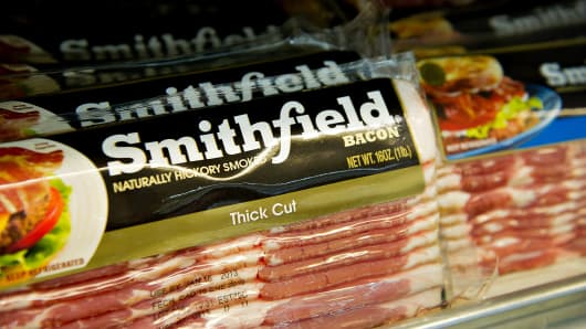 Smithfield Foods Inc. bacon sits on display for sale at a supermarket in Princeton, Illinois, U.S.