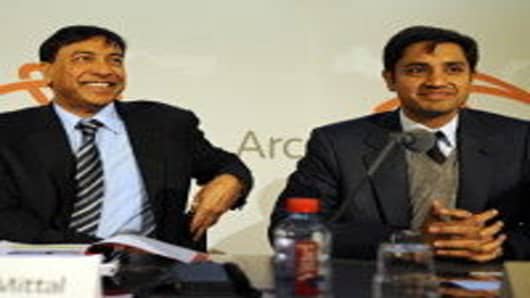 Lakshmi Mittal (L), the chairman and chief executive officer of the world's largest steel company, ArcelorMittal, with his son Aditya Mittal (R), who is the chief financial officer.