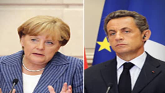 German Chancellor Angela Merkel speaks next to France's president Nicolas Sarkozy at the Elysee presidential palace in Paris on August 16, 2011 after a meeting between the two leaders on debt crisis.
