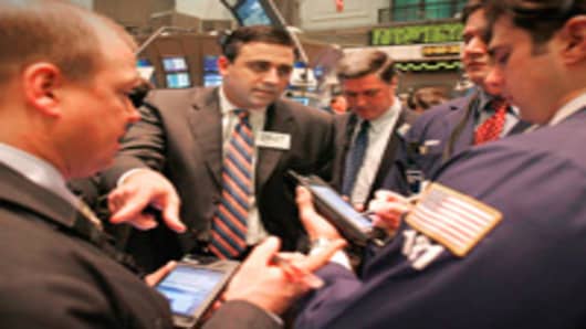 Traders at the NY Stock Exchange