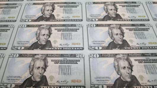 The new Series 2006 $20 currency notes, bearing the signatures of Treasury Secretary Henry Paulson and Anna Escobedo, treasurer of the United States, are seen at the Bureau of Engraving and Printing in Washington, Monday, Oct. 23, 2006. (AP Photo/J. Scott Applewhite)