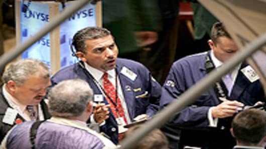 Broker works the trading floor at the New York Stock Exchange.