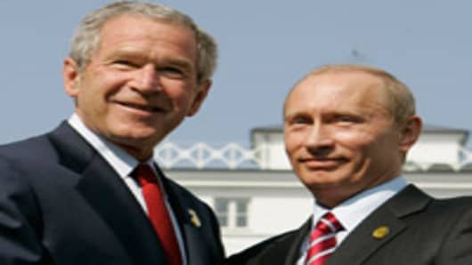 President Bush, left, shakes hands with Russian President Vladimir Putin after their meeting at the G8 Summit in Heiligendamm, Germany, Thursday June 7, 2007.